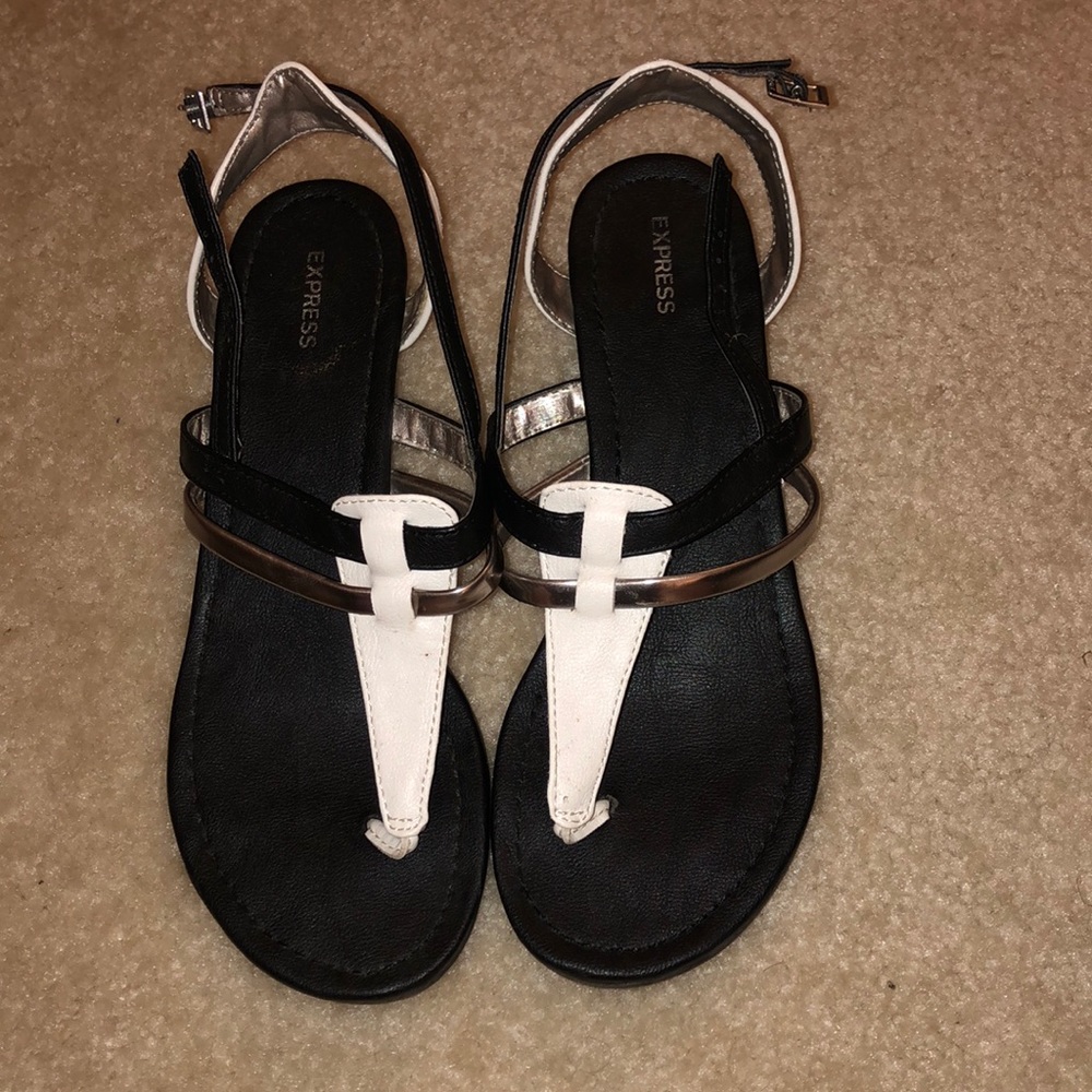 Black sandals with silver and white straps